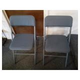 2 plastic fold up Cosco chairs. Back needs