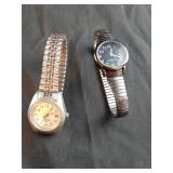Misc lot of ladies stretch band watches. Both have