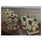2 sets of magnolia bookends. A few tiny chips