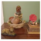 Small table water fountain with a broken piece on