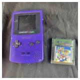 Gameboy Color with Super Mario Bros. Deluxe game