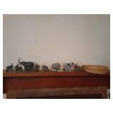 Elephant figurines and a woven basket 12.5 x 3