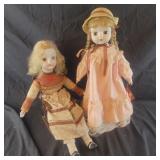 2 White Faced Porcelain Dolls - no markings