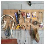 Contents of Pegboard - Chain, oil can nozzles,