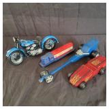 Motorcycle, train and wooden cars