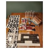 Coin wrappers, counter, mailbox numbers,