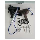 2 blow dryers , curling brush and cuticle