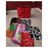 Red bag full of womens scarves
