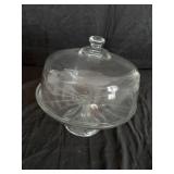 Glass pedestal cake plate. Has a chip in the top