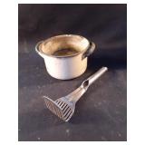 Enamel pot 6.5 x 4 with a chip and some rust. No