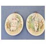 A Pair of bisque ceramic Victorian wall plaques