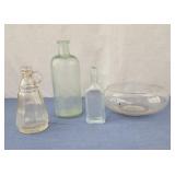 Vintage apothecary glass bottles and round glass