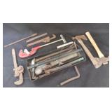 Misc tools - pipe wrench, Hatchet, pipe cutter etc