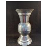Silver color vase 9 x 16.5. Has some dents