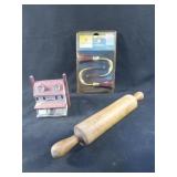 Set of trumpet hold backs, rolling pin and