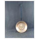 Metal copper pan with black holder decor