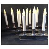 Set of 4 battery operated candle lights. Does