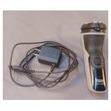 Philips Norelco Series 2000 shaver and charger.