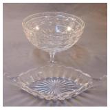 Glass pedestal candy dish and oval glass candy