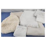Assorted towels, toilet seat cover, wash cloths