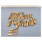 Old fashioned wood  clothes pins, some regular