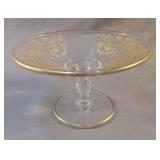 Glass pedestal with gold trim and etching