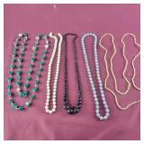 Beaded Necklaces - one is shells