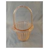 Depression pink basket with handle. Has a chip 5