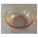 Depression pink bowl with handles. Has chopped