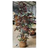 80" tall faux tree with white lights on it with