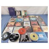 Assortment of different genres CDs music, tom