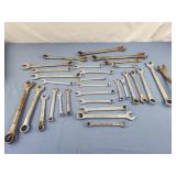 Assorted vintage wrenches, popular mechanics,