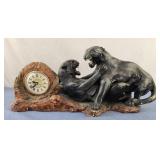 LARGE ART DECO PANTHERS FIGHTING CLOCK has some