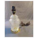 Glass lamp with brass color base 10" tall
