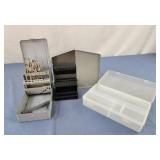 Empty drill index, empty plastic box. Metal drill