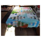 Handmade reversible quilt 84 x 52. Has spots,