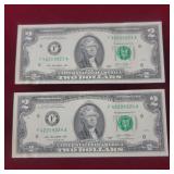 Two - 2 dollar bills with sequential serial