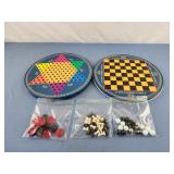 Chinese checker tin with pieces