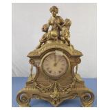 Spelter mantle clock with woman and child figures