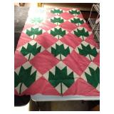 Handmade quilt facing 40 x 68. Has spots