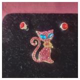 Stainless steel round earrings with red stones