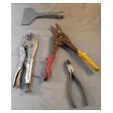 Lot of vise grips, scrapers, snips and cable