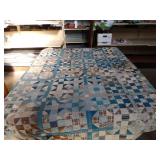 Handmade reversible quilt 88 x 72. Has stuffing.