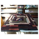 Handmade reversible quilt 48 x 64. Has some spots