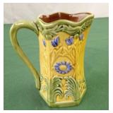 Jay Wilfred din of Andrea by Sadek pitcher. Made