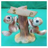 Squirrels hanging on a tree salt and