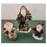 Three resin Santa
