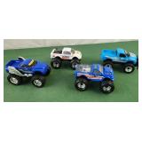 Plastic monster trucks, bigfoot, chevy, dodge