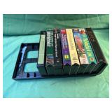 Religious and various vhs tapes in a tray