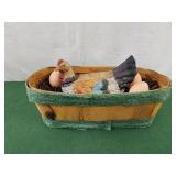 Hen in a basket with eggs decor